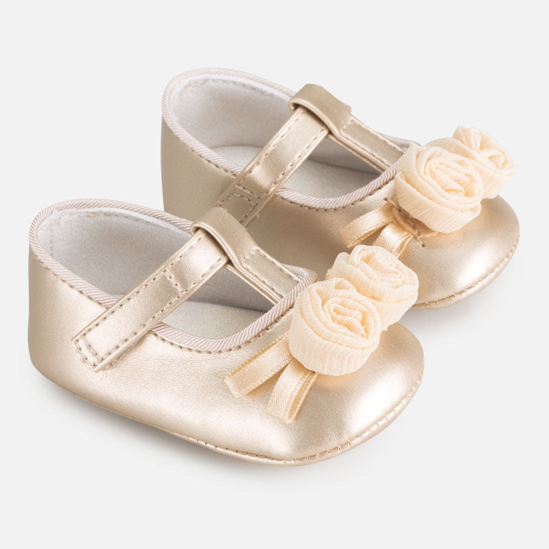 Golden colour shoes shop