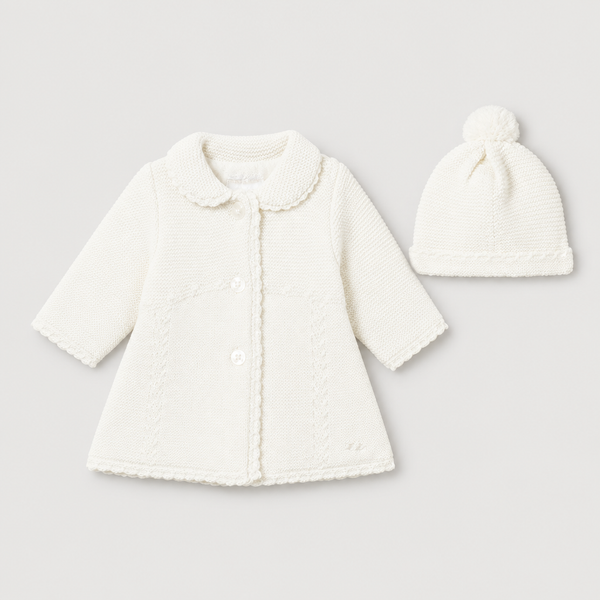 Off White Knit Coat and Hat studio photo